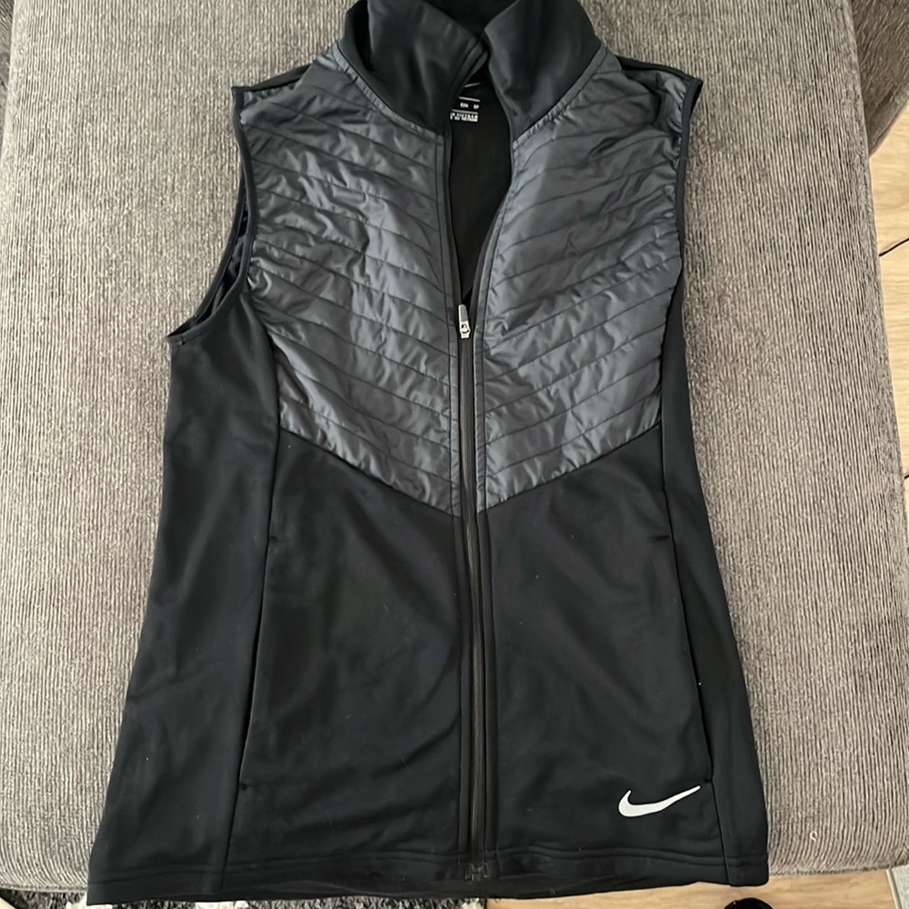 Women’s Nike lightweight running vest, size XS